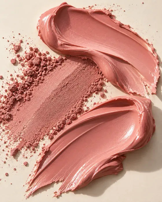 Abstract rose-pink cream and powder textures on an ivory surface